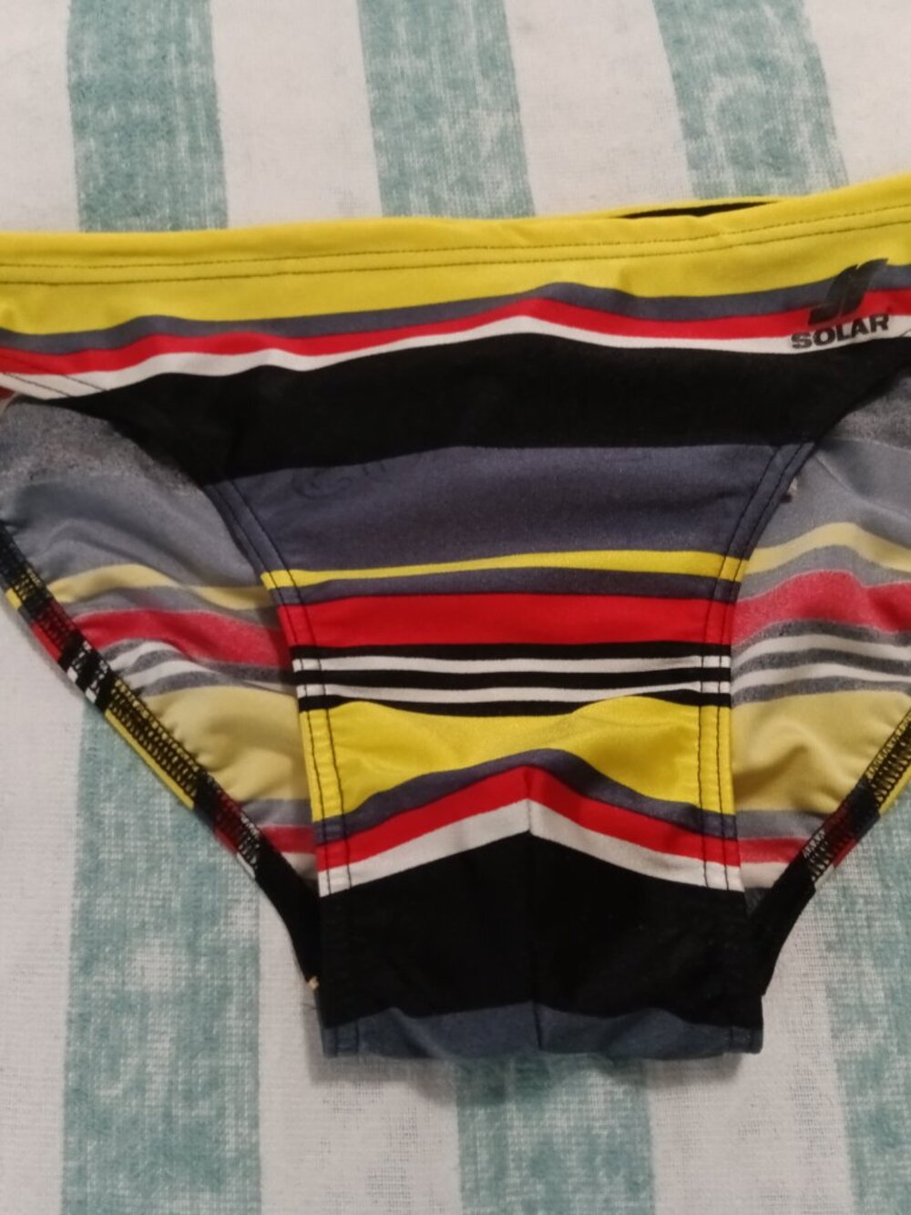 (*) VINTAGE SOLAR SWIM BRIEF, SIZE "XS" (28") MULTI-STRIPED (Pre-Owned)